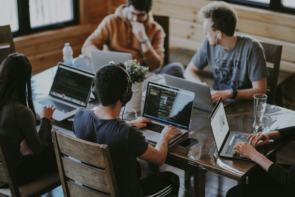 Founders reviewing a beta test plan on a laptop
